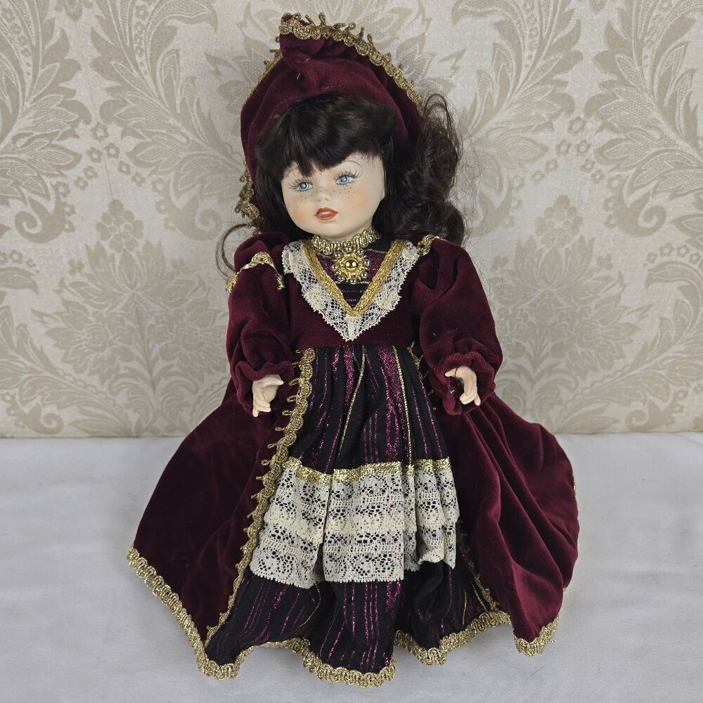 Vintage Porcelain Doll Dressed in Burgundy VelvetLace Accents Gold Trim Royal